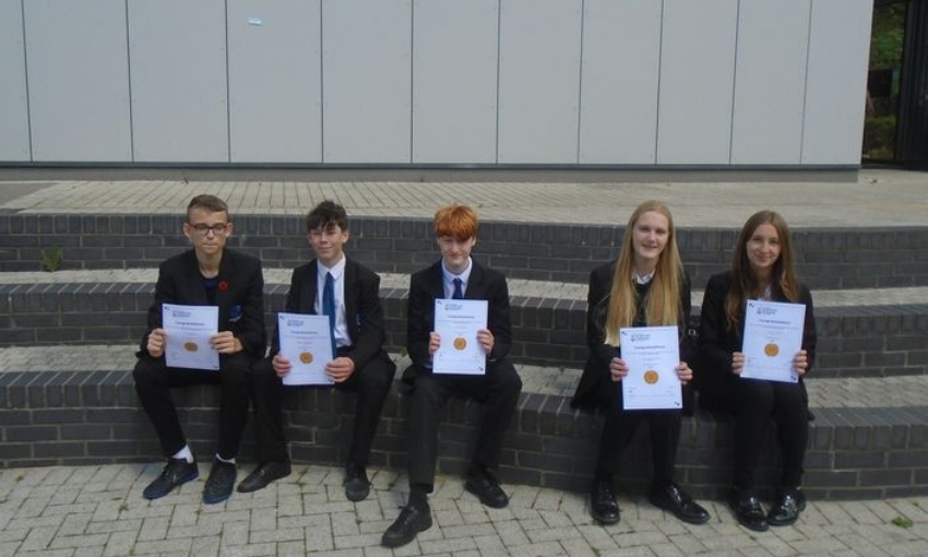 Image shows 5 of the 15 pupils that were awarded certificates after taking part in the National Scientific Thinking Challenge 